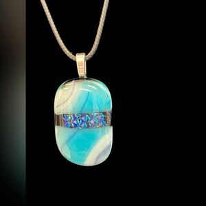 Artisan handcrafted teal,white & dichroic blue fused glass pendant on black cord